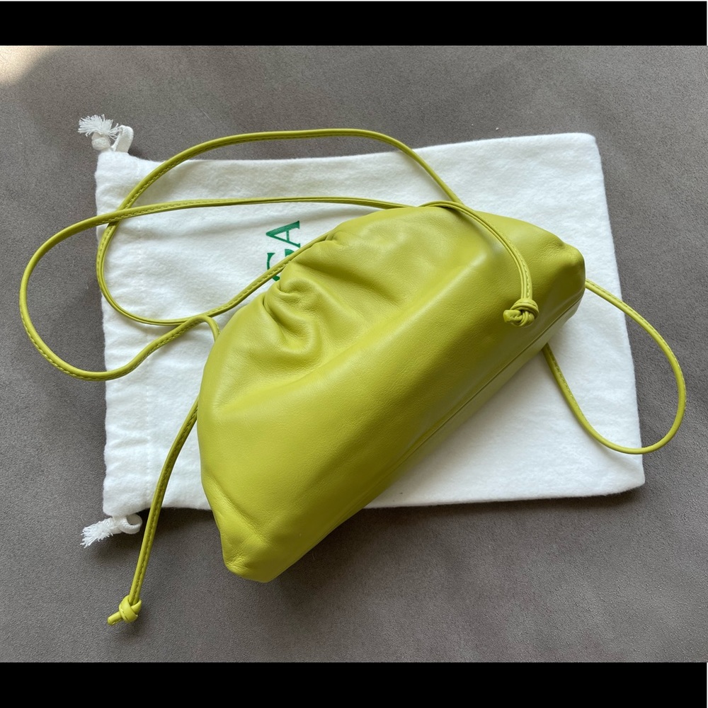 BOTTEGA VENETA Butter Calfskin The Pouch mini leather clutch in Kiwi gold